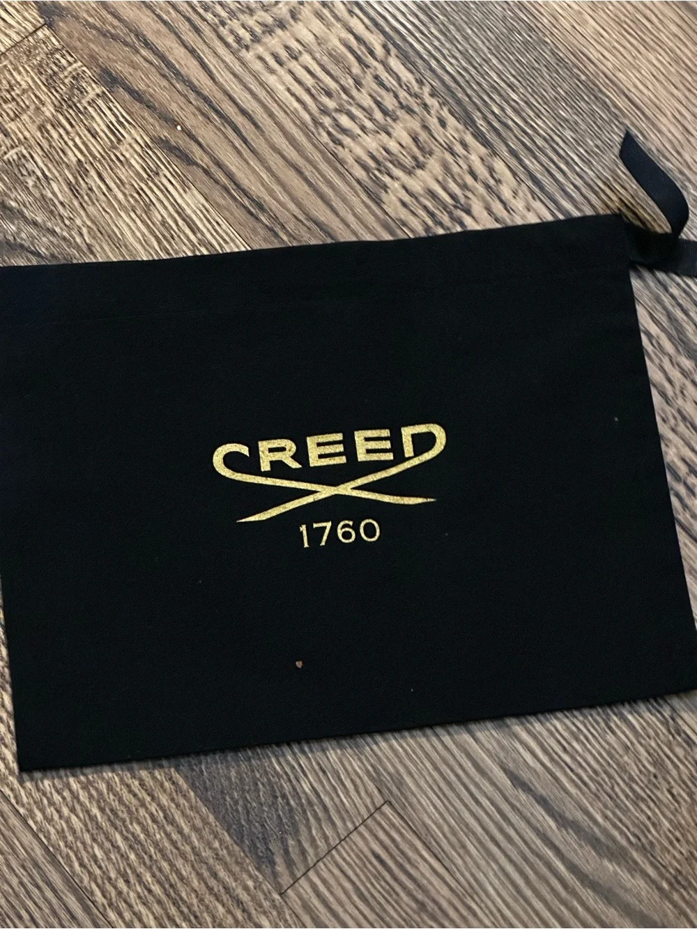 Creed Black Drawstring Pouch with Gold Logo